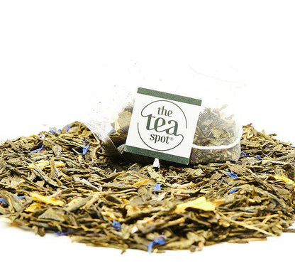 Tea leaves with a 'the tea spot' label on a white background