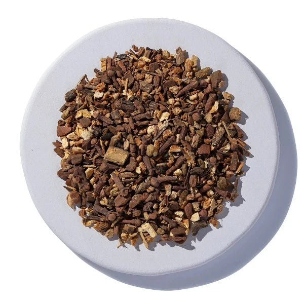 Dry herbs or spices on a white plate